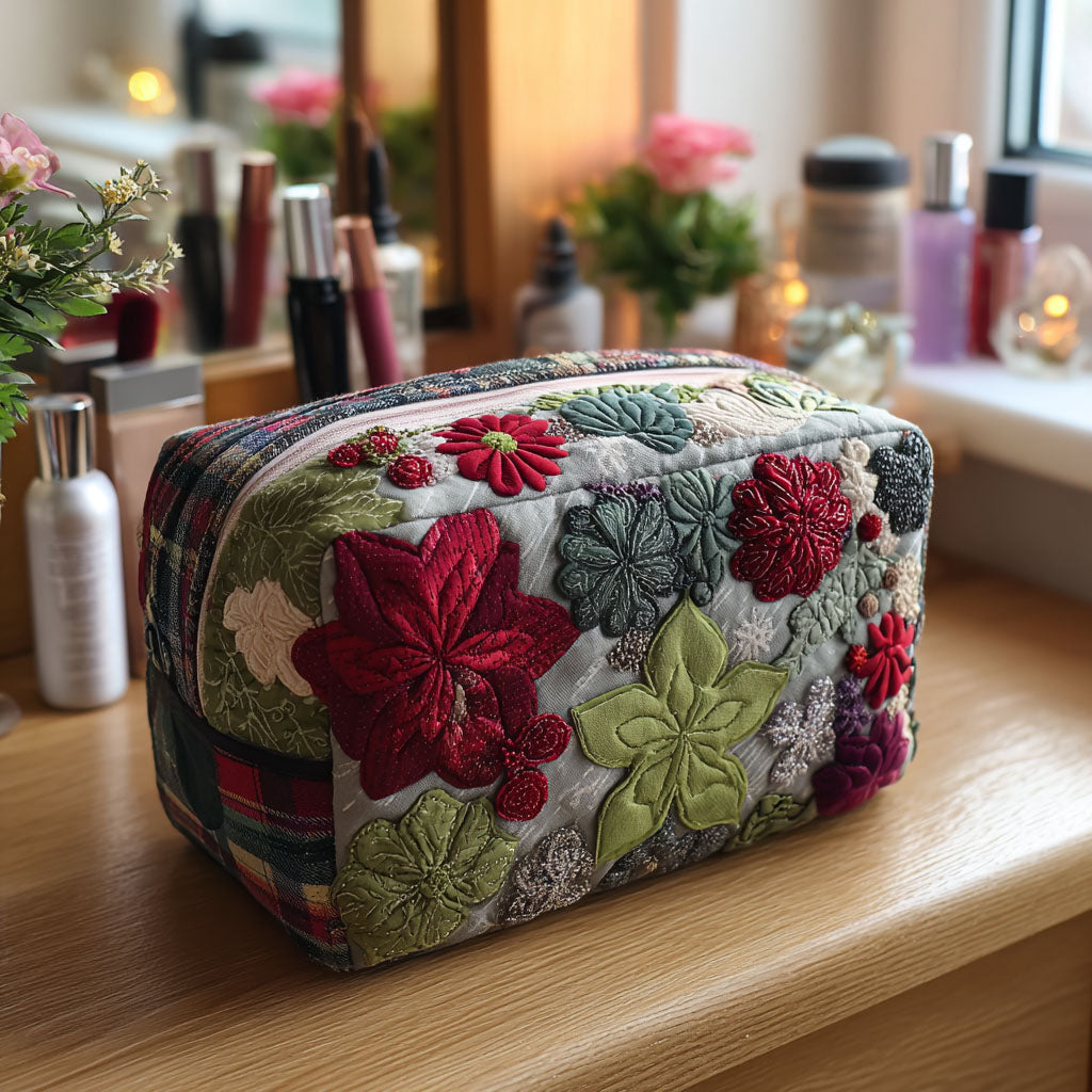 Quilted make-up bag with a Garden Song design of winter blooms, berries and sprigs of greenery in red, gold and deep green