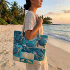 Woman carrying the Turtle Bay quilted beach bag along the shore