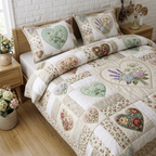 Two matching pillow shams from the Flower Patchwork quilted bedspread set