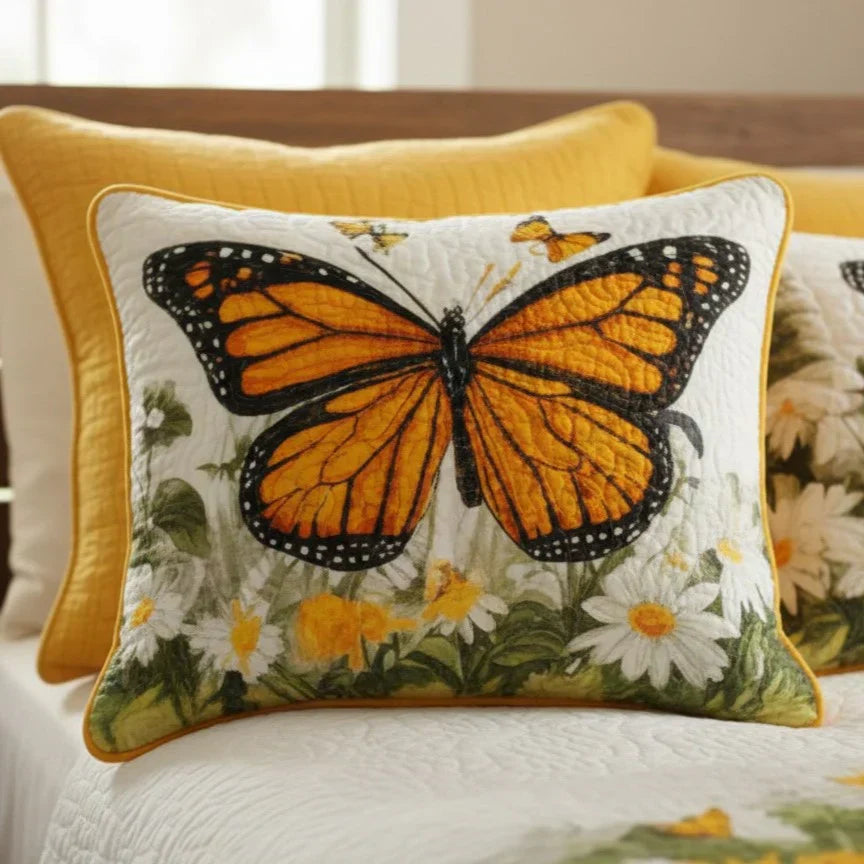 Quilted pillowcase with the Monarch Butterflies design, burnt orange and black monarch butterflies among tall grasses and seed heads