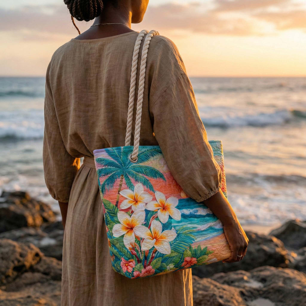 Woman carrying the Tropical Spirit quilted beach bag along the shore
