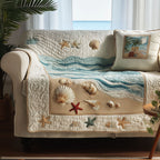 Seashore Treasures quilted sofa cover – shells on sand below waves