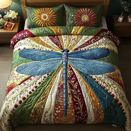 Quilted bedspread set with golden dragonflies scattered across a deep teal ground in the Golden Dragonfly design