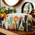 Green Spines quilted make-up bag with green cacti and bright desert flowers on cream