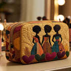 Heart Sisters quilted make-up bag with three women in bright dresses with red hearts on gold