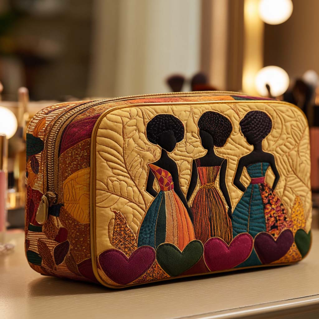 Heart Sisters quilted make-up bag with three women in bright dresses with red hearts on gold