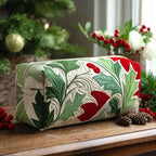 Holly Bloom quilted make-up bag with red and green holly leaves swirling across white quilting