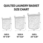 Marine Turtles quilted laundry basket seen from the side, carry handles and wave-stitch quilting visible
