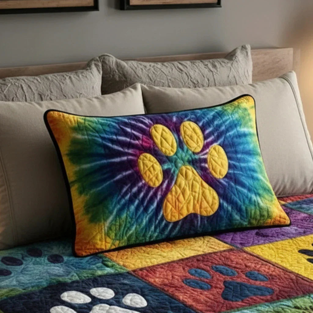 Quilted pillowcase with the Loving Paws design of soft brown and grey paw prints wandering across a pale ground