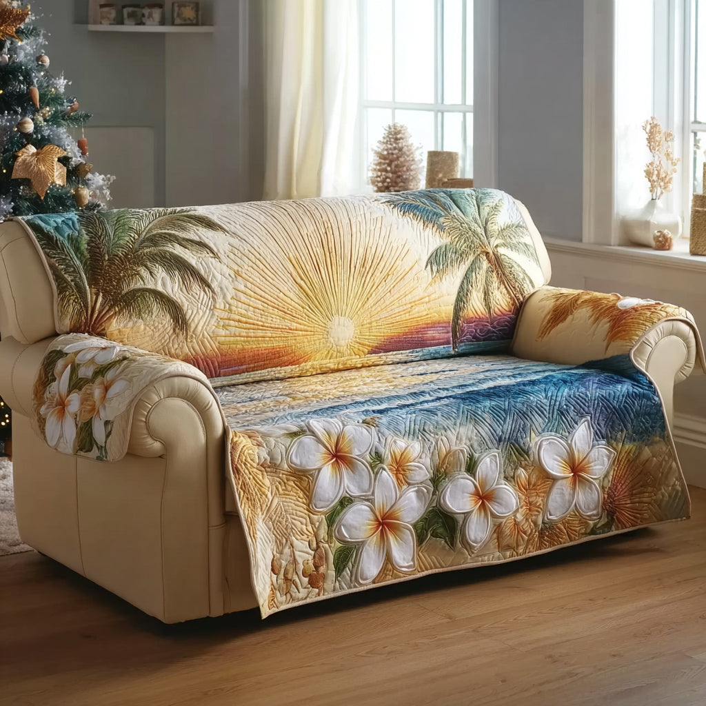 Tropical Sunset Blooms quilted sofa cover – plumeria below a golden sunset