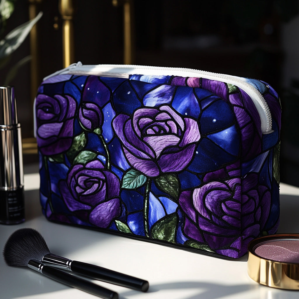 Quilted make-up bag with deep wine and plum roses opening against a near-black ground, framed by dark green leaves, in the Midnight Rose design