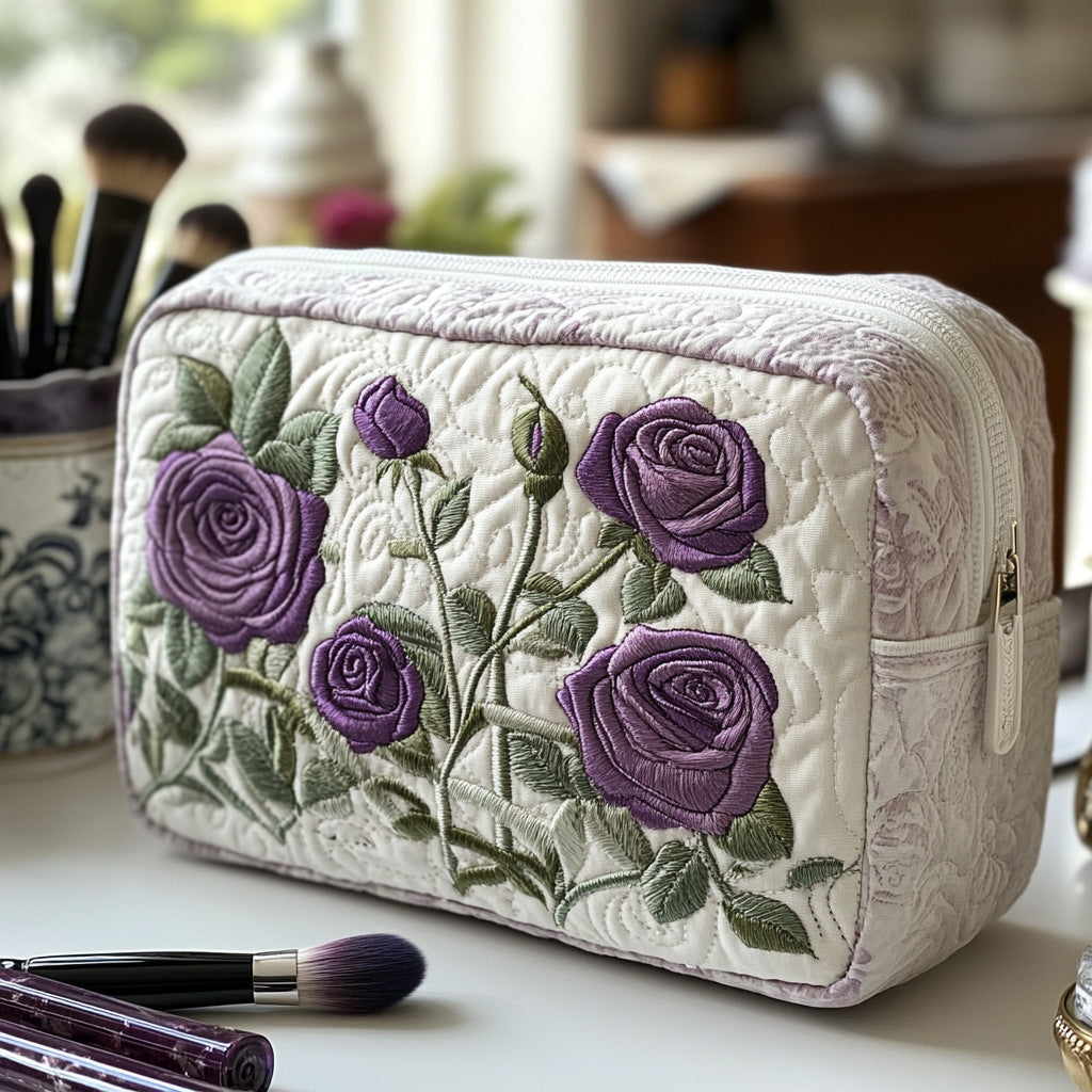 Quilted make-up bag with pale violet roses lit by cool silver light against a deep dusk-blue ground in the Moonlit Bloom design