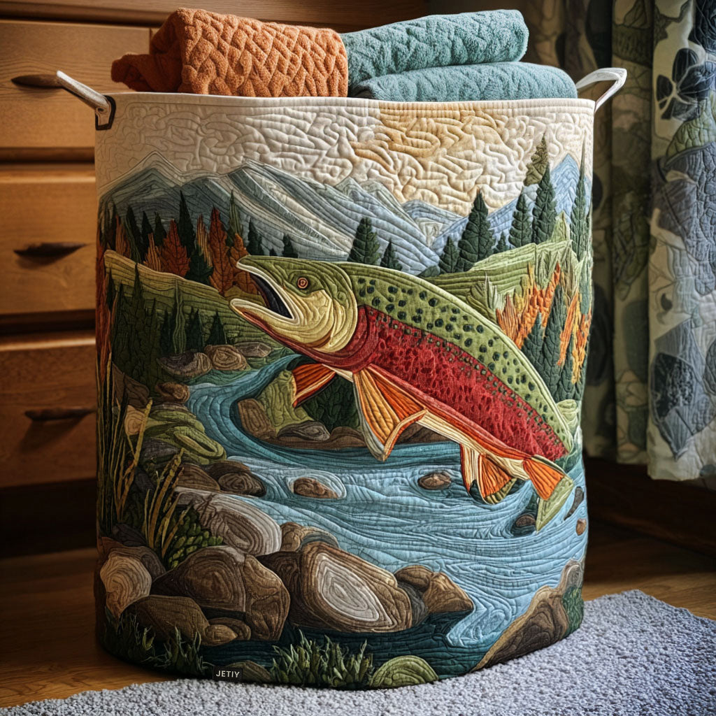 Quilted laundry basket with a stream winding through pine woods and pale rock in the Mountain Stream design