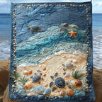Turtles on the Shore quilted throw – sea turtles and shells on a sandy shore