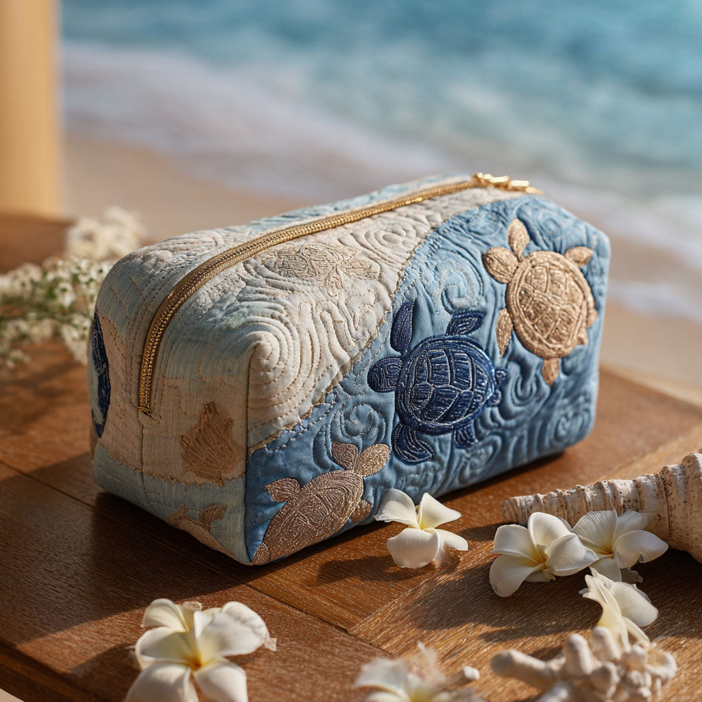 Ocean Turtle quilted make-up bag with pale blue sea turtle swimming across soft blue quilting