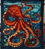Red Octopus quilted throw – red octopus in swirling blue water