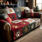 Pawliday Patchwork quilted sofa cover – paw prints in festive patchwork