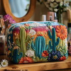 Prickly Whimsy quilted make-up bag with chunky teal cacti among bright flowers