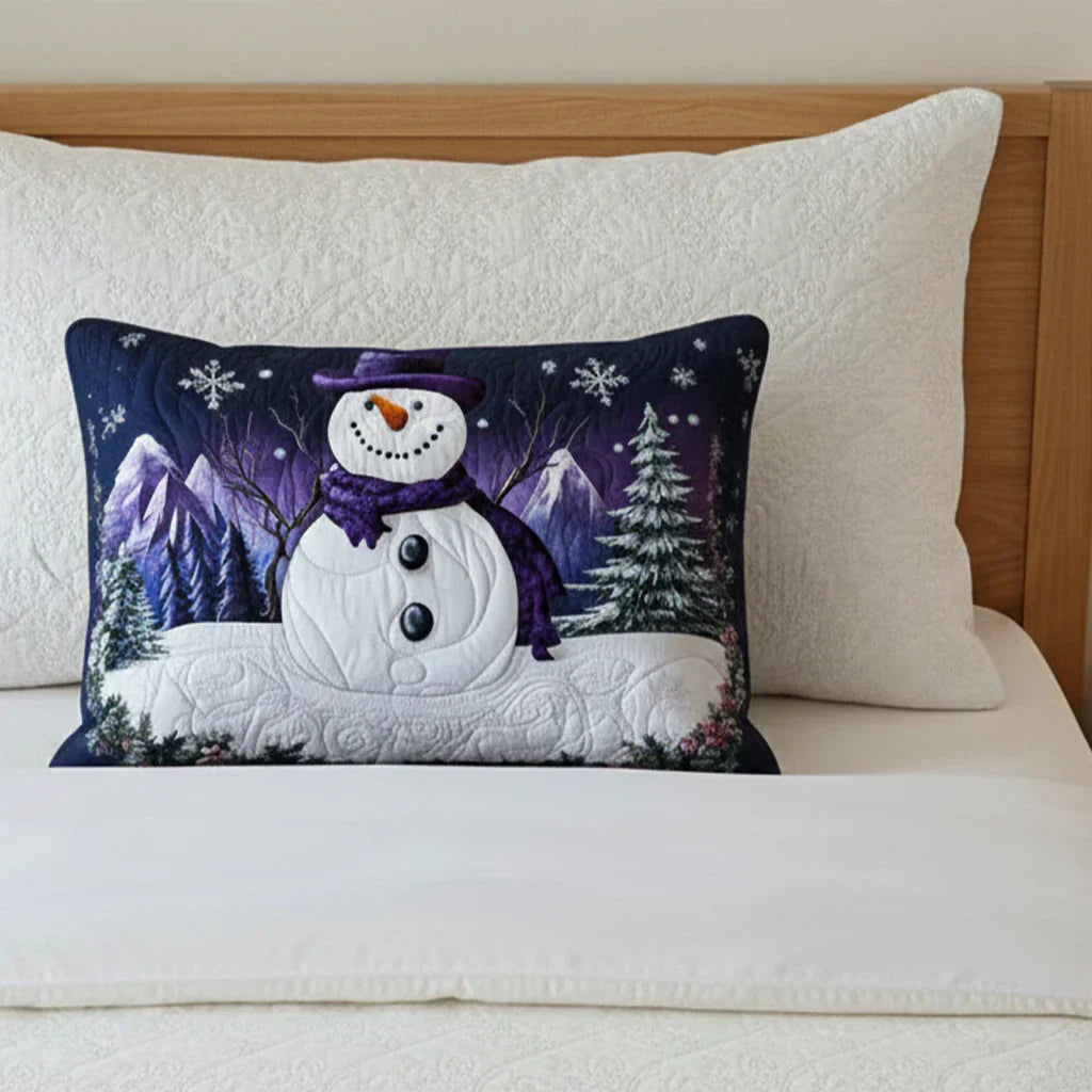 Quilted pillowcase with the Purple Snowman design of a snowman in a purple scarf and hat among falling snow and holly sprigs
