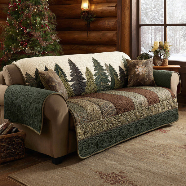 Serene Forest quilted sofa cover with a pine treeline in deep green, slate and sage above bands of moss, chestnut and stone