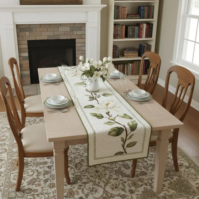 The Rustic Magnolia table runner shown full length with its blooms and bare branches