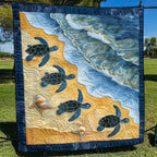 Turtles to the Sea quilted throw – sea turtles crossing golden sand into waves
