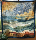Seascape quilted throw – soft bands of sky, sea and sand