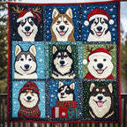 Christmas Huskies quilted throw – huskies in Santa hats in blue squares