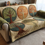 Four Seasons Trees quilted sofa cover – seasonal trees in round frames