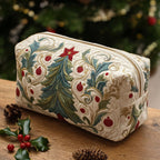Starry Garland quilted make-up bag with green Christmas tree garland with red baubles and swirls on ivory