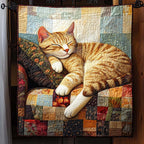 Sunlit Nap quilted throw – ginger tabby napping on a patchwork armchair