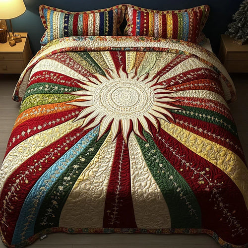 Quilted bedspread set with a large golden sun and spreading amber rays, the Sunny Glow design