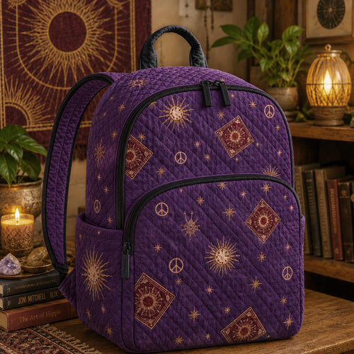 Artisan quilted backpack with a bohemian sun and crescent moon amongst scattered stars and fine pattern
