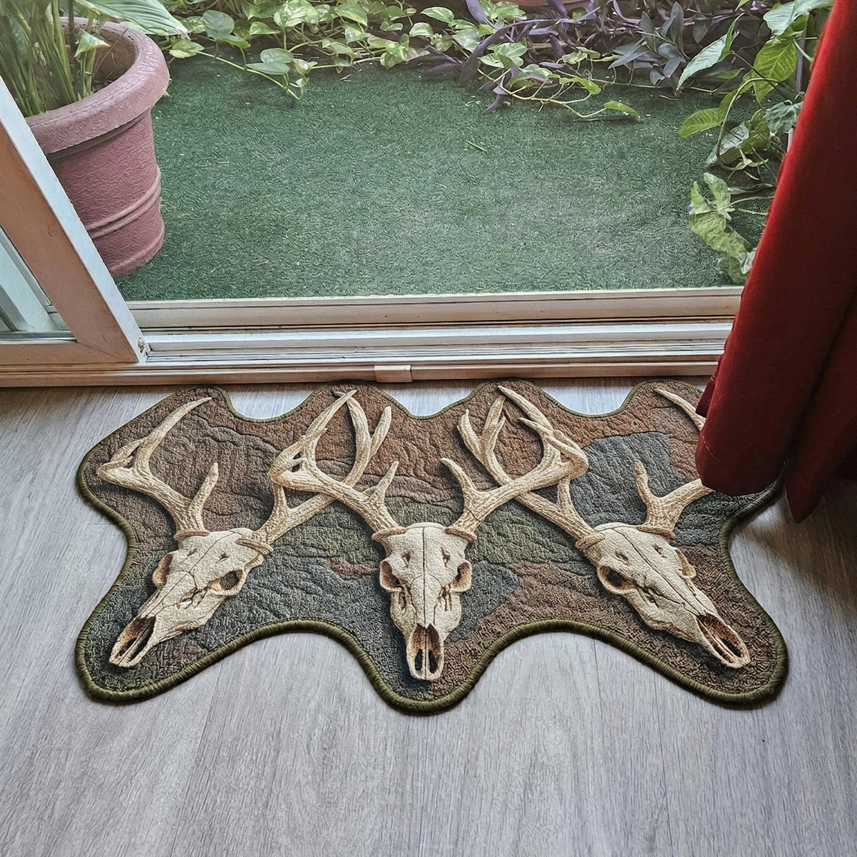 Trio Skulls shaped doormat – three antlered skulls