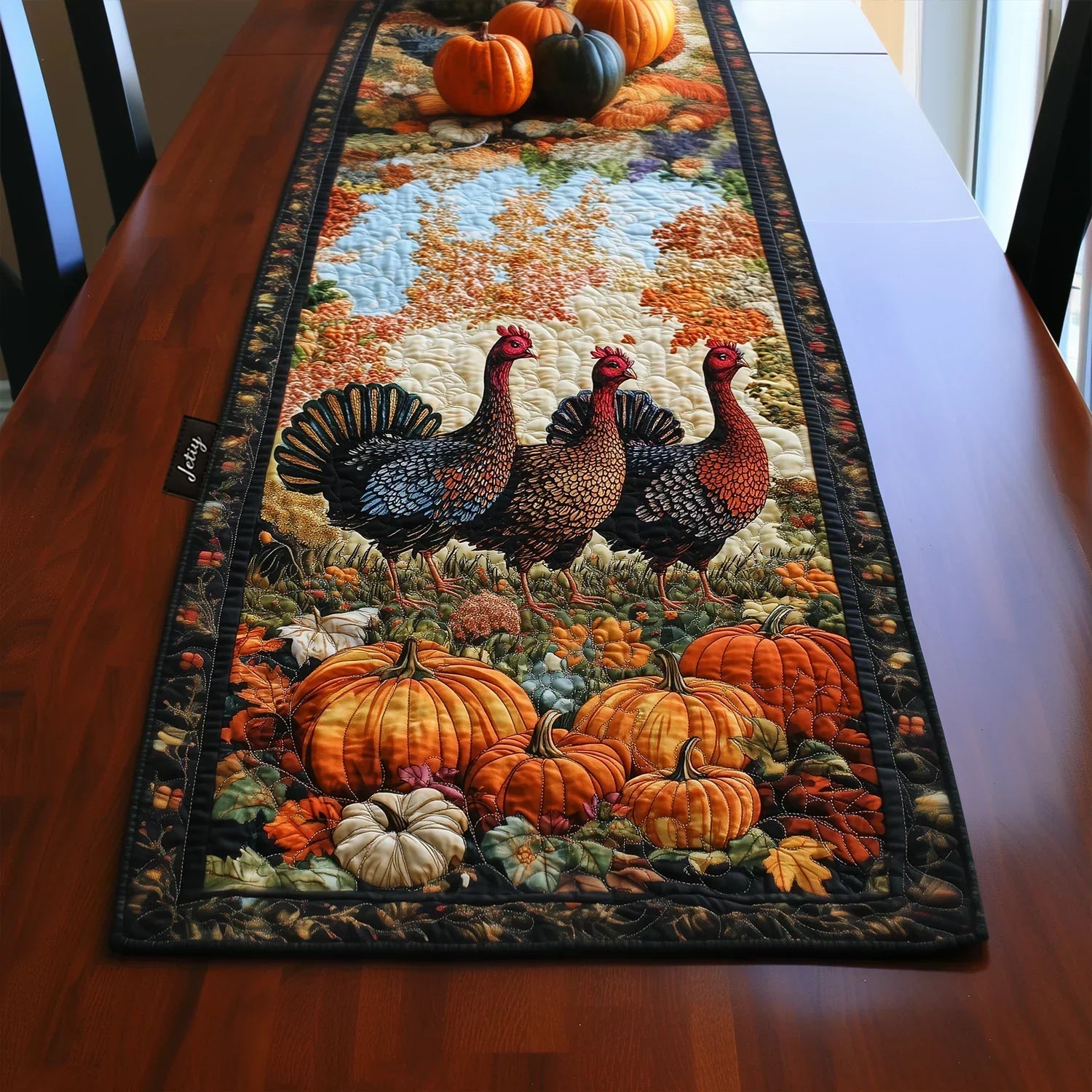Quilted table runner with a row of turkeys, tail feathers fanned in bronze, russet and green