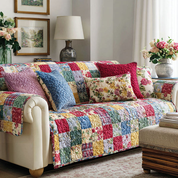 Summer Scrapbook quilted sofa cover with hundreds of small red, blue, yellow and green squares and floral panels