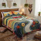 The Vintage Wanderlust quilted bedspread set on a made bed
