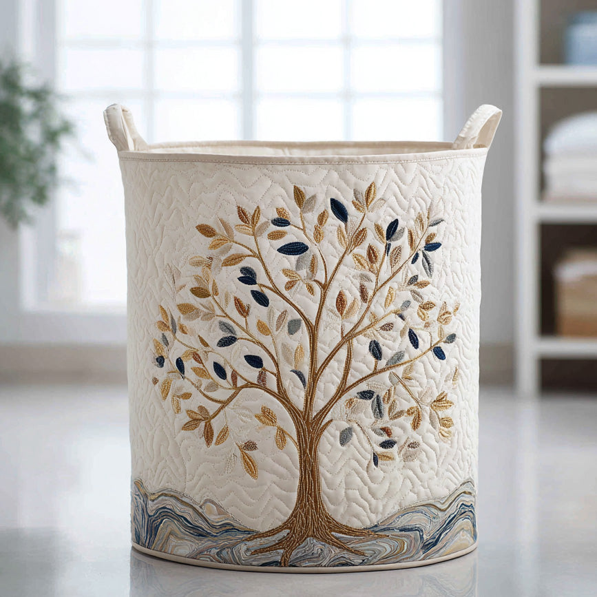 Quilted laundry basket with a gold and navy tree of life on ivory