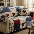 Country Heart Squares quilted sofa cover – red hearts in navy patchwork