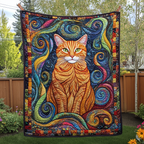 Swirling Ginger Cat quilted throw – ginger cat in swirling blue and gold