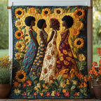 Sisters in Sunflowers quilted throw – three women in patterned dresses among sunflowers