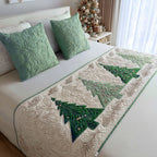 Green Fir Trail quilted bed runner – green fir trees on cream edged in sage