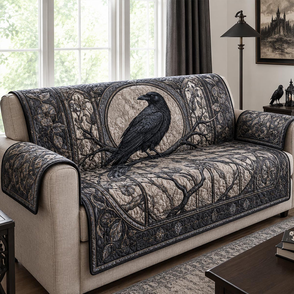 Raven Moon quilted sofa cover with a raven on a bare branch inside a pale full moon in charcoal and ivory