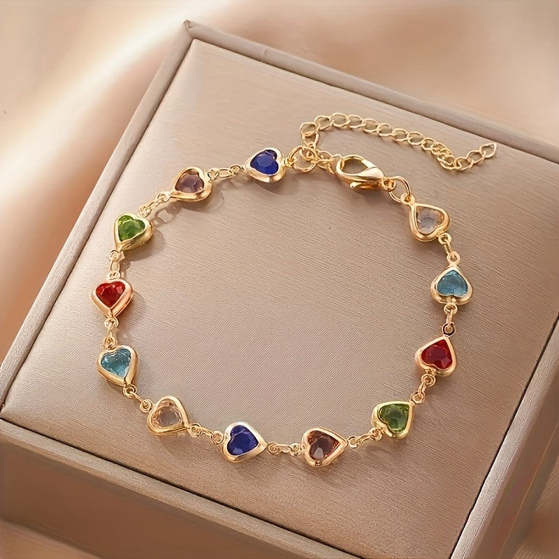 Gold-tone bracelet of linked colourful hearts