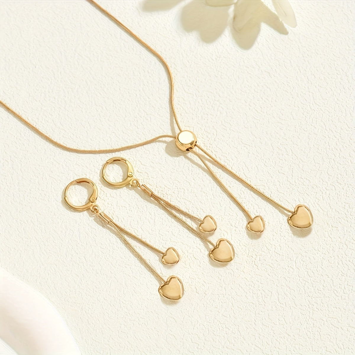 Gold-tone heart Y-necklace and heart drop earrings