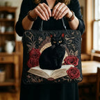 Woman carrying the Black Cat on Books artisan quilted tote bag