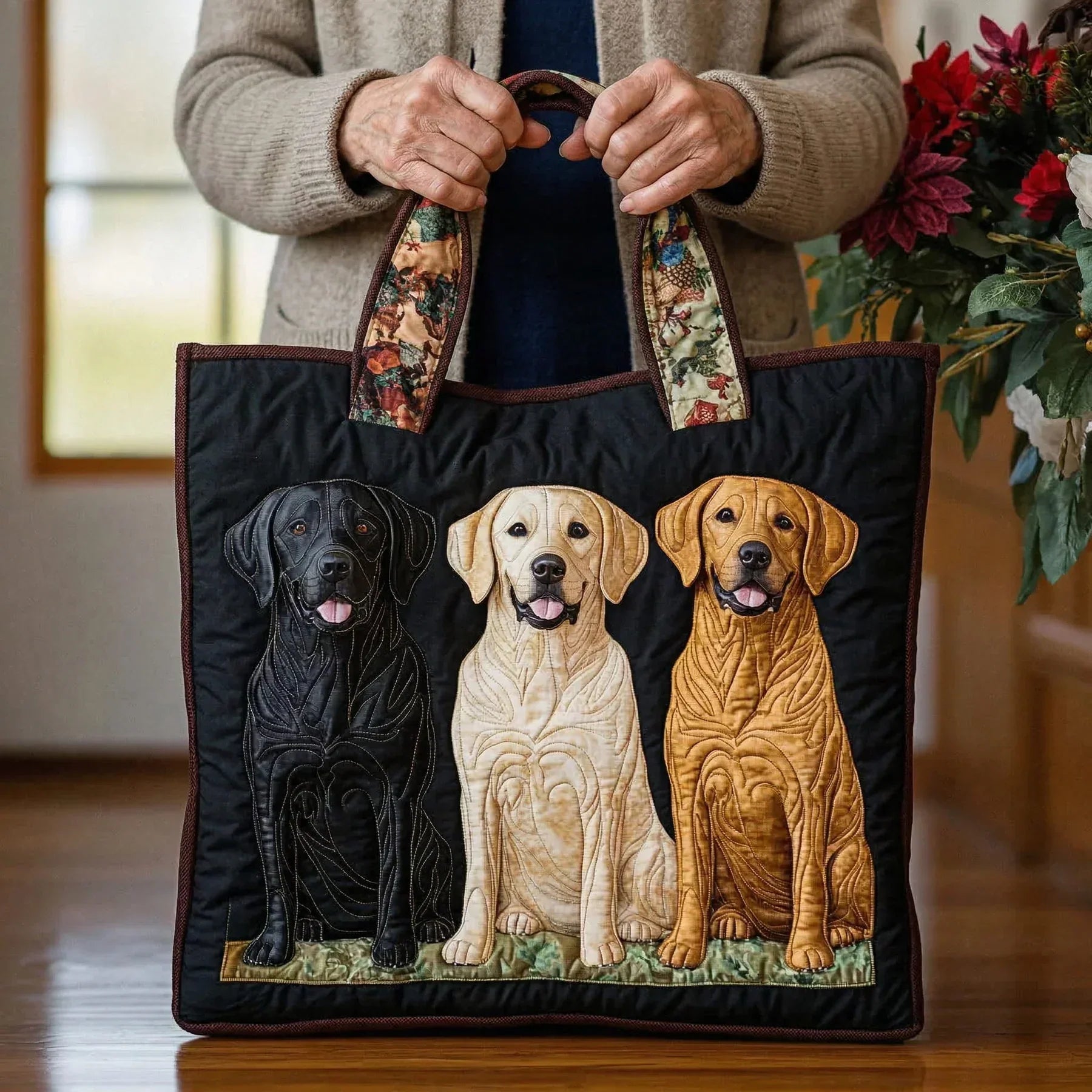 Woman carrying the Three Labradors artisan quilted tote bag