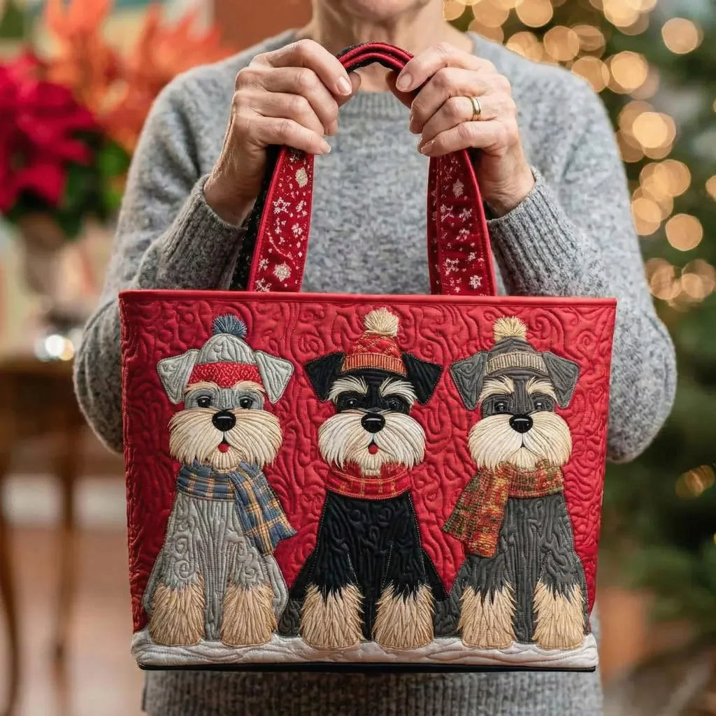 Woman carrying the Trio of Schnauzers artisan quilted tote bag